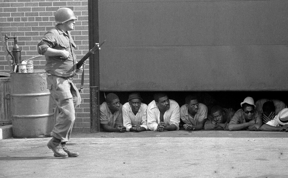 Riots in Detroit started after a 23 July police raid on an illegal after-hours' club. In the days that followed, 33 blacks and 10 whites were dead, and more than 1,400 buildings burned. AP Riots in Detroit started after a 23 July police raid on an illegal after-hours' club. In the days that followed, 33 blacks and 10 whites were dead, and more than 1,400 buildings burned. AP