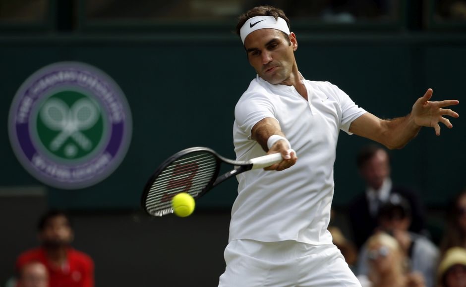 Roger Federer's record-breaking 85th match win at Wimbledon did not require much work because his opponent, Alexandr Dolgopolov, retired due to injury. AP Roger Federer's record-breaking 85th match win at Wimbledon did not require much work because his opponent, Alexandr Dolgopolov, retired due to injury. AP