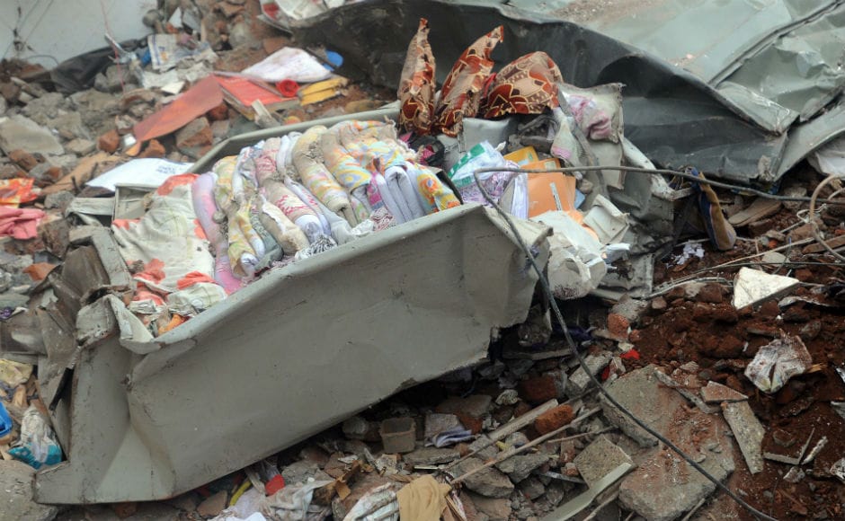 The 40-year old Siddhi Sai Apartments at Ghatkopar's Damodar Park area, which caved in on Tuesday, housed around 15 families. Fire engines, a rescue van and total 108 ambulances were rushed to the spot immediately. A total of 60 NDRF jawans along with sniffer dogs were also deployed to carry out rescue operations. Firstpost/ Sachin Gokhale The 40-year old Siddhi Sai Apartments at Ghatkopar's Damodar Park area, which caved in on Tuesday, housed around 15 families. Fire engines, a rescue van and total 108 ambulances were rushed to the spot immediately. A total of 60 NDRF jawans along with sniffer dogs were also deployed to carry out rescue operations. Firstpost/ Sachin Gokhale