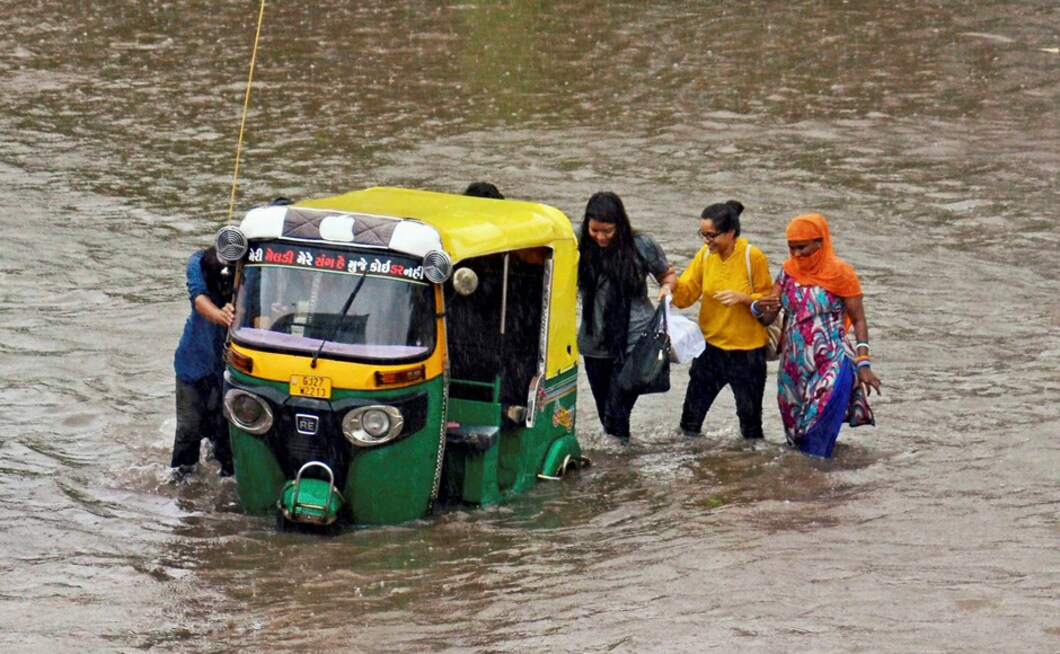 The Ahmedabad Municipal Corporation issued a warning to people not to venture near electricity poles and streetlights as it may prove fatal due to the water-logging. PTI The Ahmedabad Municipal Corporation issued a warning to people not to venture near electricity poles and streetlights as it may prove fatal due to the water-logging. PTI