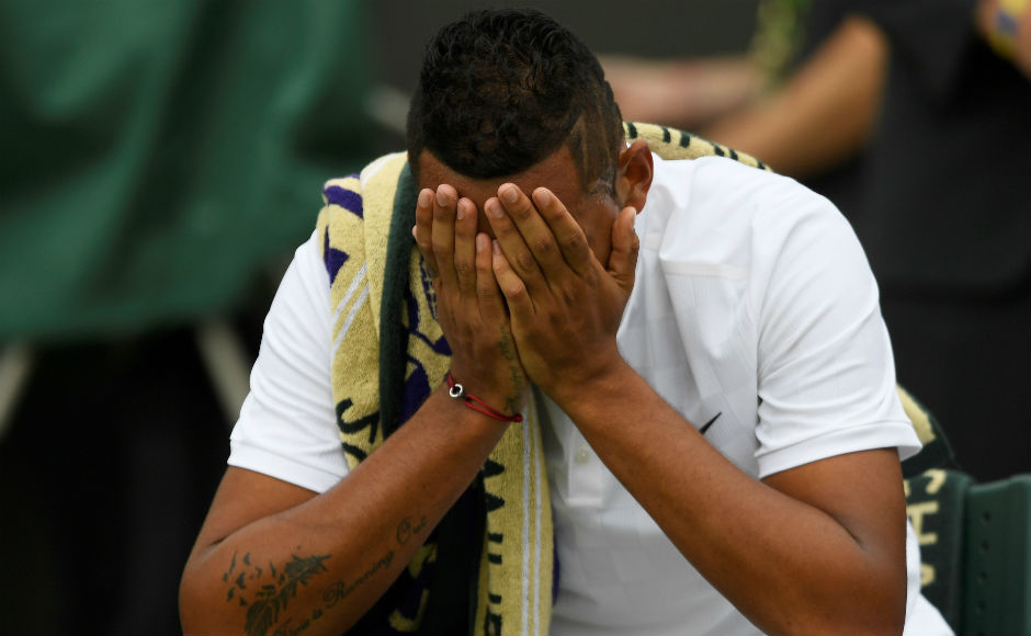 Dejected Nick Kyrgois buries his face into his hands as he is knocked out of the first round of Wimbledon. The 20th seed was losing 3-6, 4-6 to Pierre-Hugues Herbert after which he was forced to retire due to hip injury. Reuters Dejected Nick Kyrgois buries his face into his hands as he is knocked out of the first round of Wimbledon. The 20th seed was losing 3-6, 4-6 to Pierre-Hugues Herbert after which he was forced to retire due to hip injury. Reuters