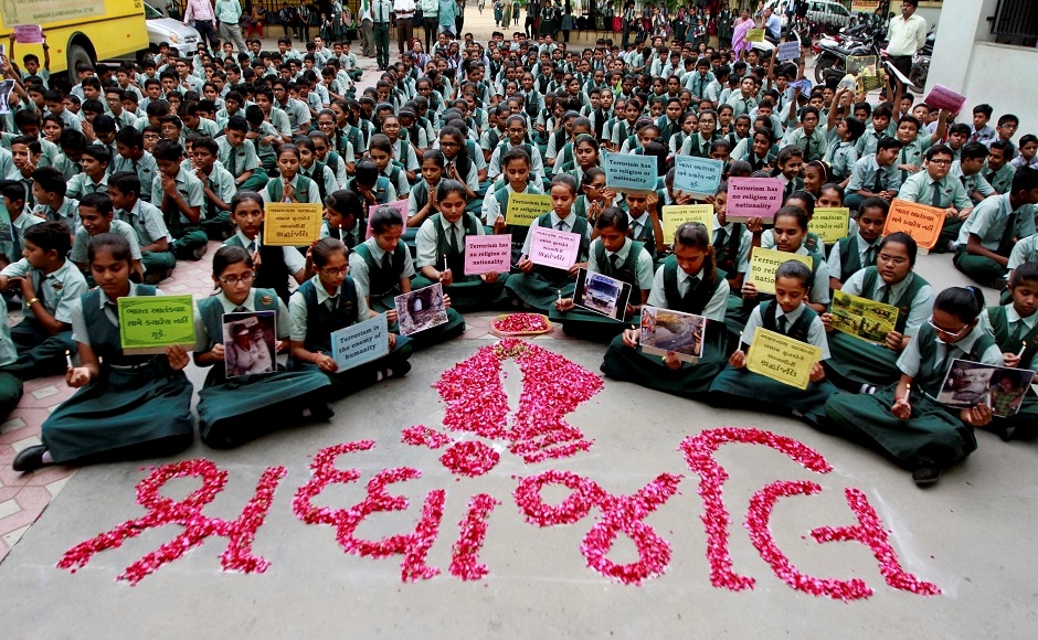 In Ahmadabad, students prayed for the victims of the Amarnath Yatra terror attacks. PTI In Ahmadabad, students prayed for the victims of the Amarnath Yatra terror attacks. PTI