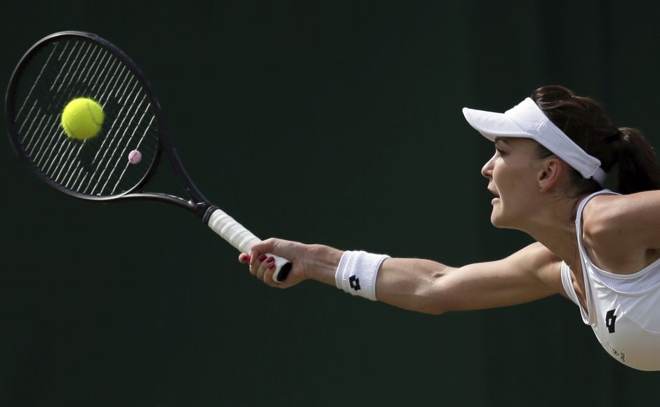 Agnieszka Radwanska fought her way through a tough opening set against Jelena Jankovic but wrapped up her match in two sets to move into the second round. AP Agnieszka Radwanska fought her way through a tough opening set against Jelena Jankovic but wrapped up her match in two sets to move into the second round. AP