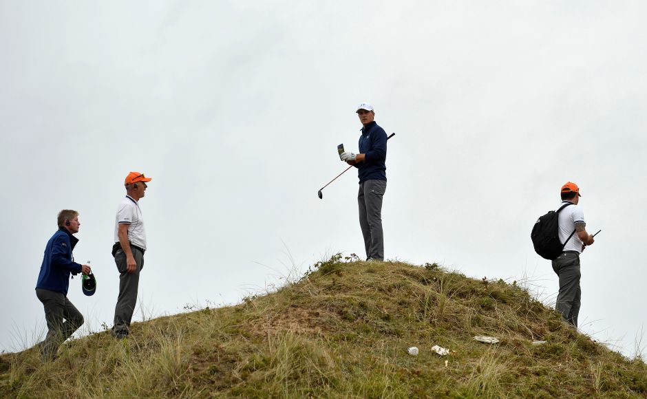 Jordan Spieth after landing in the rough off the 13th tee during the final round. He was forced to take a penalty stroke after deeming the ball unplayable and, after a lengthy series of deliberations, he scrambled to make a creditable bogey out of the par-four hole. Reuters Jordan Spieth after landing in the rough off the 13th tee during the final round. He was forced to take a penalty stroke after deeming the ball unplayable and, after a lengthy series of deliberations, he scrambled to make a creditable bogey out of the par-four hole. Reuters