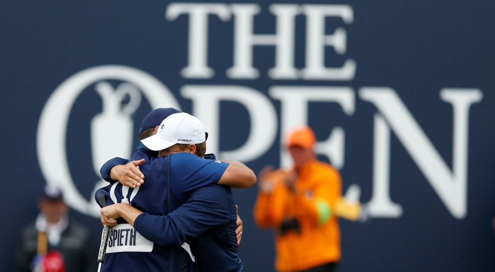Jordan Spieth celebrates with his caddie after holing a putt on the 18th green to win The Open Championship. Reuters Jordan Spieth celebrates with his caddie after holing a putt on the 18th green to win The Open Championship. Reuters