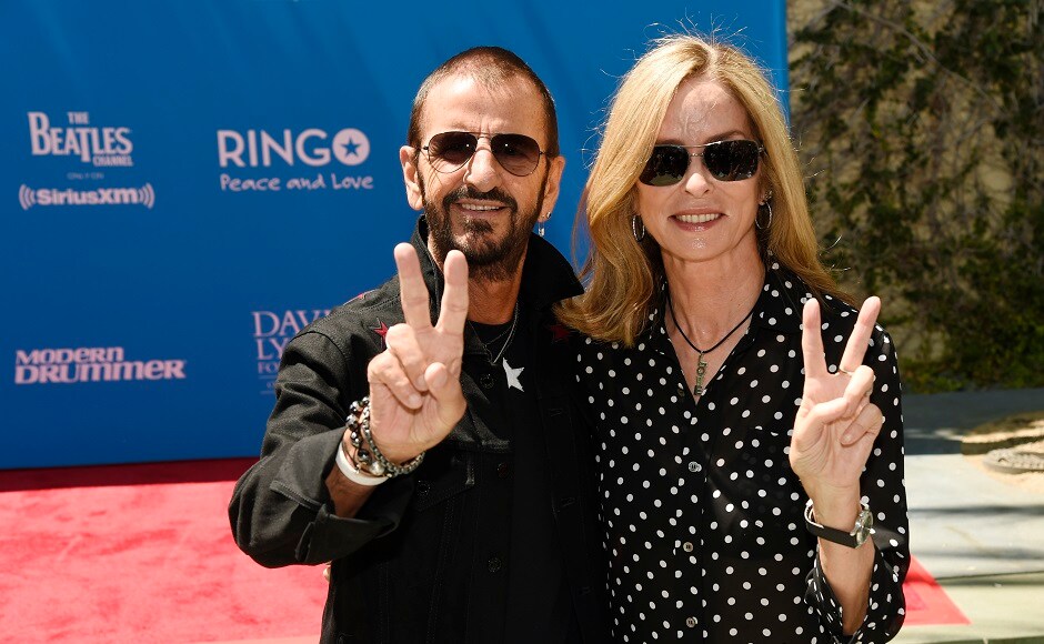 Starr and his wife Barbara Bach give the peace sign to photographers. Photo by AP Starr and his wife Barbara Bach give the peace sign to photographers. Photo by AP