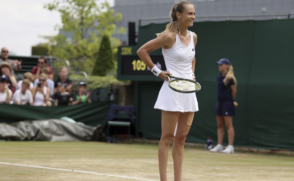 Slovakia's Magdalena Rybarikova smiles after beating Ukraine's Lesia Tsurenko. AP Slovakia's Magdalena Rybarikova smiles after beating Ukraine's Lesia Tsurenko. AP