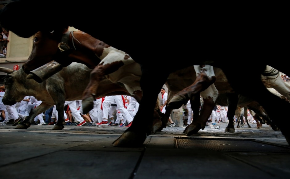 The daily bull run starts at 8 am (0600 GMT) and usually lasts between three and five minutes. There are eight runs in total during the festival. Reuters The daily bull run starts at 8 am (0600 GMT) and usually lasts between three and five minutes. There are eight runs in total during the festival. Reuters