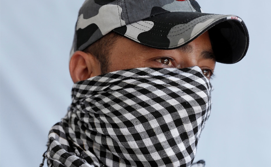 A 24-year-old police officer, who asked to remain anonymous, poses for a portrait in Kashmir. "I joined the police as I had no job. Being part of the police force is very difficult for me under these circumstances but I have no choice. Even our own children and relatives take part in these protests," he said. Reuters A 24-year-old police officer, who asked to remain anonymous, poses for a portrait in Kashmir. "I joined the police as I had no job. Being part of the police force is very difficult for me under these circumstances but I have no choice. Even our own children and relatives take part in these protests," he said. Reuters