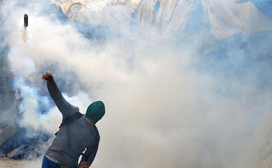 A stone pelter throws a tear gas canister back at police during disturbances in Srinagar in Kashmir. Pellet guns are intended not to be lethal, but their use by Indian security forces has caused severe injuries and several deaths of bystanders, women and children among them. Human rights groups have urged India to renounce their use, calling it a violation of United Nations' principles of restraint. Reuters A stone pelter throws a tear gas canister back at police during disturbances in Srinagar in Kashmir. Pellet guns are intended not to be lethal, but their use by Indian security forces has caused severe injuries and several deaths of bystanders, women and children among them. Human rights groups have urged India to renounce their use, calling it a violation of United Nations' principles of restraint. Reuters