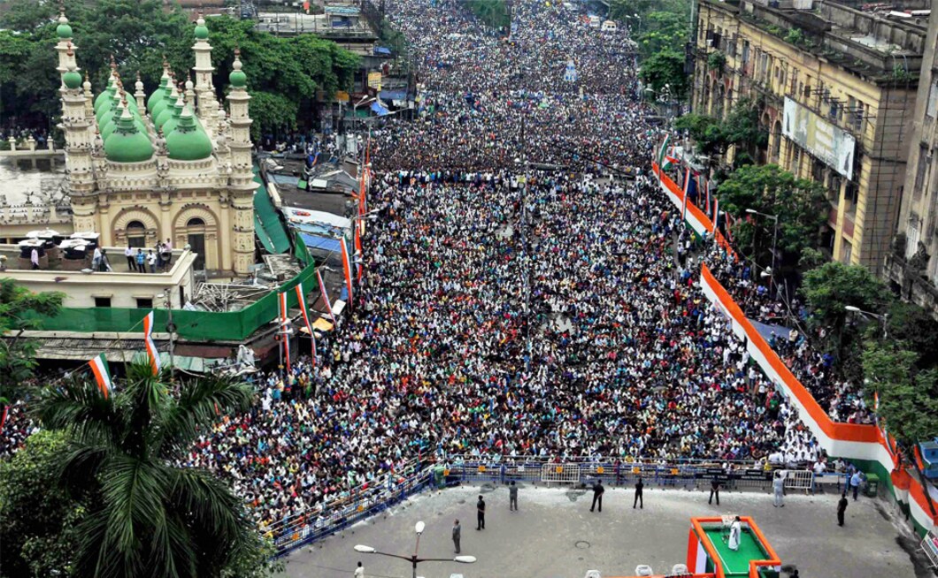 Trinamool Congress supremo and West Bengal Chief Minister Mamata Banerjee addresses the party's mass rally in Kolkata to commemorate 'Shahid Diwas' for 13 Youth Congress workers killed in police firing in 1993 during the Left Front regime, on Friday. She said those who were involved in the police firing on 21 July, 1993 would not be spared. Banerjee was the head of Youth Congress at the time. PTI Trinamool Congress supremo and West Bengal Chief Minister Mamata Banerjee addresses the party's mass rally in Kolkata to commemorate 'Shahid Diwas' for 13 Youth Congress workers killed in police firing in 1993 during the Left Front regime, on Friday. She said those who were involved in the police firing on 21 July, 1993 would not be spared. Banerjee was the head of Youth Congress at the time. PTI