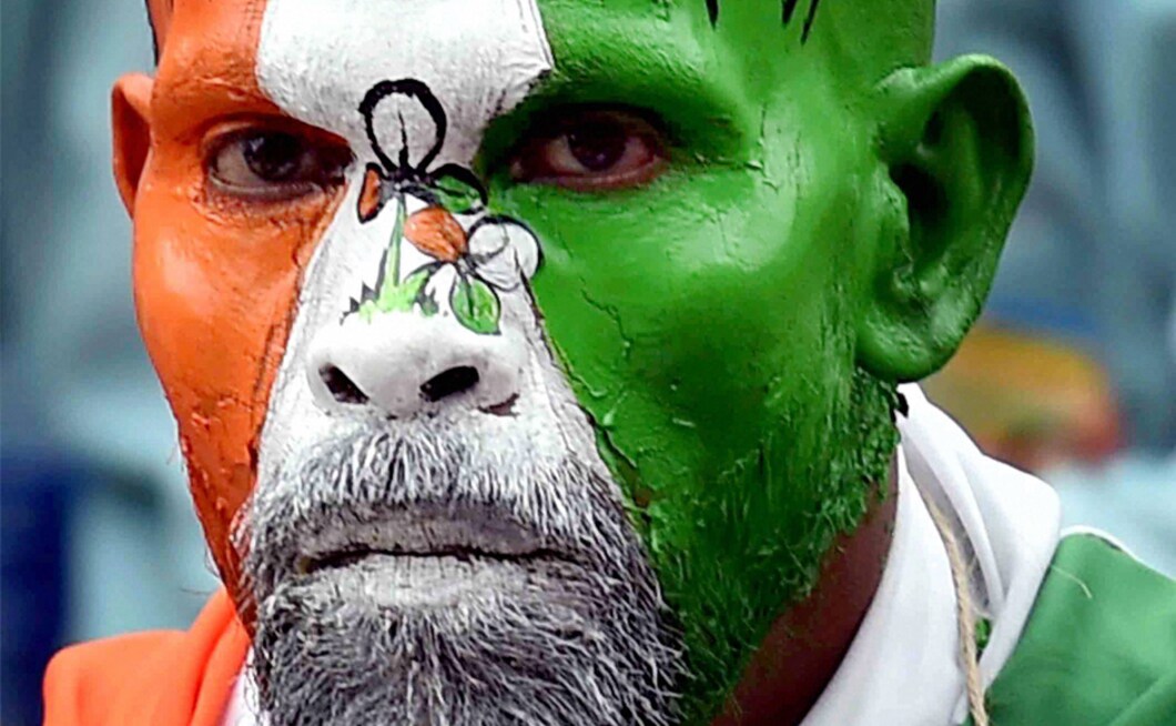 A TMC activist paints his face to seek support for undivided West Bengal and not to support Gorkhaland during the party's mass rally to commemorate 'Shahid Diwas'. Mamata Banerjee blamed the BJP-led government at the Centre for the impasse in Darjeeling while exuding confidence that peace would be restored in the region soon. PTI A TMC activist paints his face to seek support for undivided West Bengal and not to support Gorkhaland during the party's mass rally to commemorate 'Shahid Diwas'. Mamata Banerjee blamed the BJP-led government at the Centre for the impasse in Darjeeling while exuding confidence that peace would be restored in the region soon. PTI