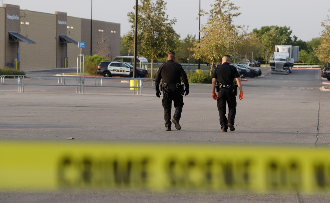 A hearse sits in the parking space of the Walmart store where the migrants were found. In 2003, 19 would-be migrants died in an overheated truck while being taken from south Texas near the Mexican border to Houston. The smugglers in their haste to evade authorities often leave passengers without air conditioning, and consequentially without air to breathe. AP A hearse sits in the parking space of the Walmart store where the migrants were found. In 2003, 19 would-be migrants died in an overheated truck while being taken from south Texas near the Mexican border to Houston. The smugglers in their haste to evade authorities often leave passengers without air conditioning, and consequentially without air to breathe. AP
