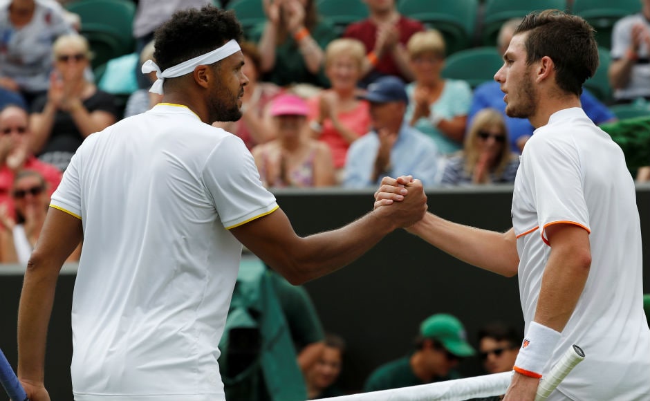 Wildcard entry Cameron Norrie congratulates Frenchman Jo-Wilfried Tsonga, who beat him 6-3, 6-2, 6-2 and advances into the second round of Wimbledon. Reuters Wildcard entry Cameron Norrie congratulates Frenchman Jo-Wilfried Tsonga, who beat him 6-3, 6-2, 6-2 and advances into the second round of Wimbledon. Reuters