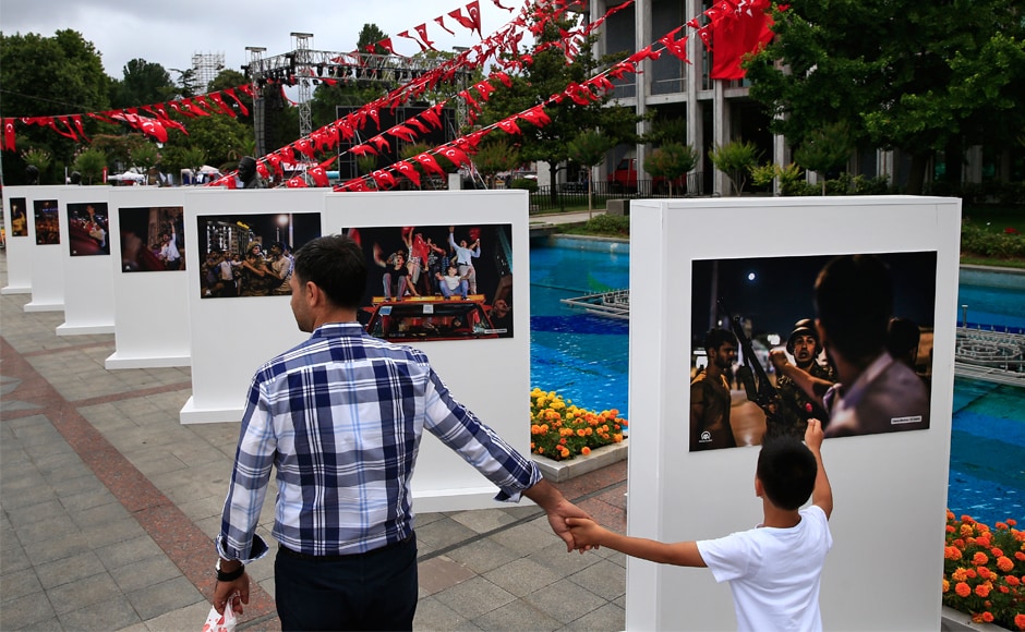 People visit an outdoor photo exhibition in Istanbul, featuring photographs of the takeover attempt. The attempt was the greatest challenge to the rule of Erdogan, who has been in power since 2003, first as prime minister and later as president. AP People visit an outdoor photo exhibition in Istanbul, featuring photographs of the takeover attempt. The attempt was the greatest challenge to the rule of Erdogan, who has been in power since 2003, first as prime minister and later as president. AP