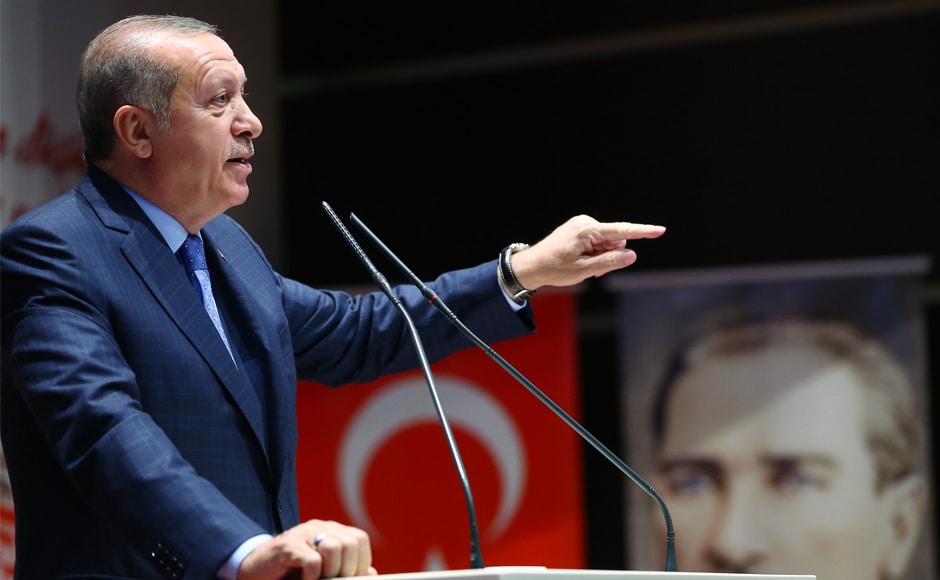 Erdogan delivers a speech acknowledging the coup. He also is scheduled to deliver a speech in parliament at 2.32 am local time on Sunday — the exact moment the assembly was attacked a year ago. AP Erdogan delivers a speech acknowledging the coup. He also is scheduled to deliver a speech in parliament at 2.32 am local time on Sunday — the exact moment the assembly was attacked a year ago. AP