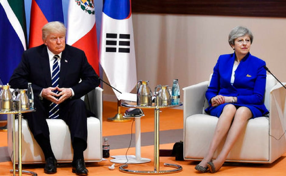 US president Donald Trump and Britain's prime minister Theresa May at the start of the informal "retreat meeting" on the first day of the summit in Hamburg. AP US president Donald Trump and Britain's prime minister Theresa May at the start of the informal "retreat meeting" on the first day of the summit in Hamburg. AP