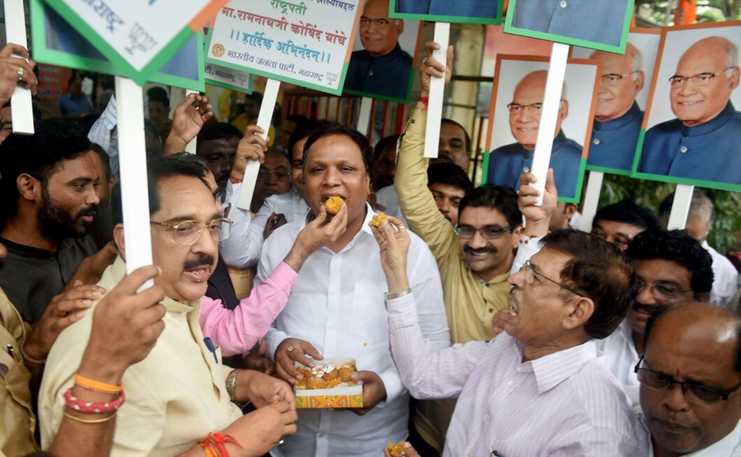 BJP workers celebrate Ram Nath Kovind's victory in Mumbai on Thursday. PTI BJP workers celebrate Ram Nath Kovind's victory in Mumbai on Thursday. PTI