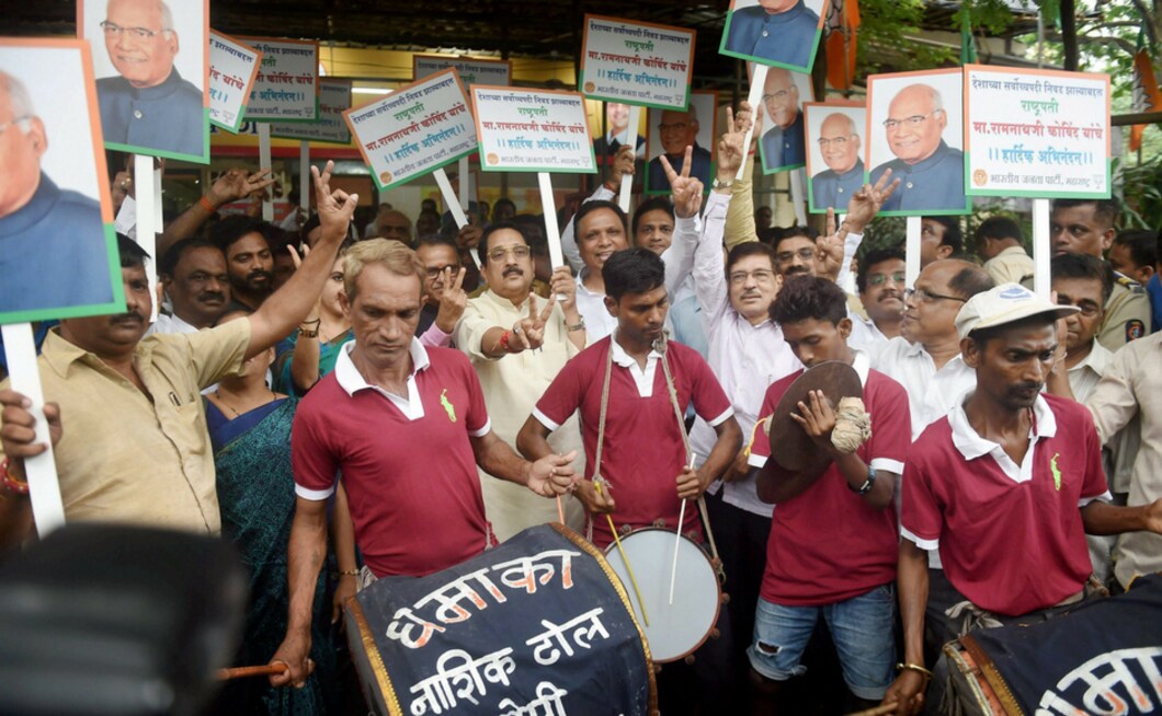 BJP workers celebrate Ram Nath Kovind's victory in Mumbai on Thursday. PTI BJP workers celebrate Ram Nath Kovind's victory in Mumbai on Thursday. PTI
