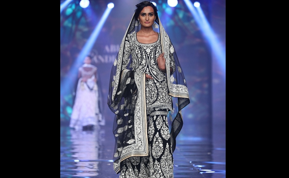 Another piece from their collection, displayed by a model on the ramp. Another piece from their collection, displayed by a model on the ramp.