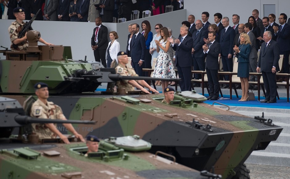 Five of the 145 US troops who took part in the parade wore period World War 1 uniforms and Trump saluted the detachment as it passed. French soldiers taking part in the mission against the Islamic State also took part in the parade. AP Five of the 145 US troops who took part in the parade wore period World War 1 uniforms and Trump saluted the detachment as it passed. French soldiers taking part in the mission against the Islamic State also took part in the parade. AP