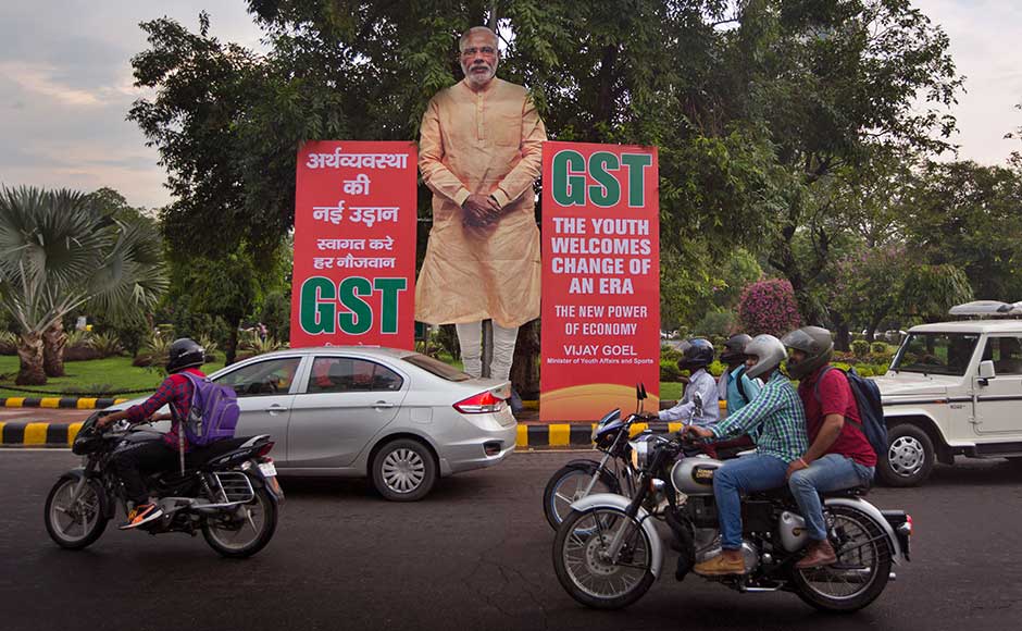Terming the GST a "good and simple tax", Prime Minister Narendra Modi said it will put an end to harassment of honest traders and small businesses while integrating the country into one market with one tax. AP Terming the GST a "good and simple tax", Prime Minister Narendra Modi said it will put an end to harassment of honest traders and small businesses while integrating the country into one market with one tax. AP