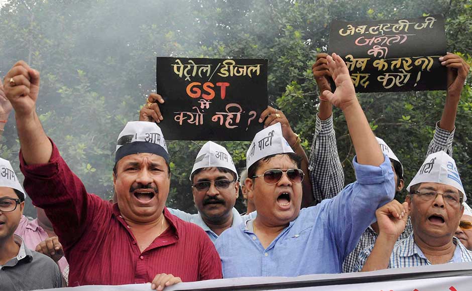 However, Modi's sentiment wasn't matched by the Opposition, with Congress, Trinamool Congress, Left parties, DMK, NC, RJD, and other parties boycotting the midnight launch and dubbing it as a "tamasha". Aam Aadmi Party (AAP) activists shouted slogans against Finance Minister Arun Jaitley during a protest against GST in Patna. PTI However, Modi's sentiment wasn't matched by the Opposition, with Congress, Trinamool Congress, Left parties, DMK, NC, RJD, and other parties boycotting the midnight launch and dubbing it as a "tamasha". Aam Aadmi Party (AAP) activists shouted slogans against Finance Minister Arun Jaitley during a protest against GST in Patna. PTI