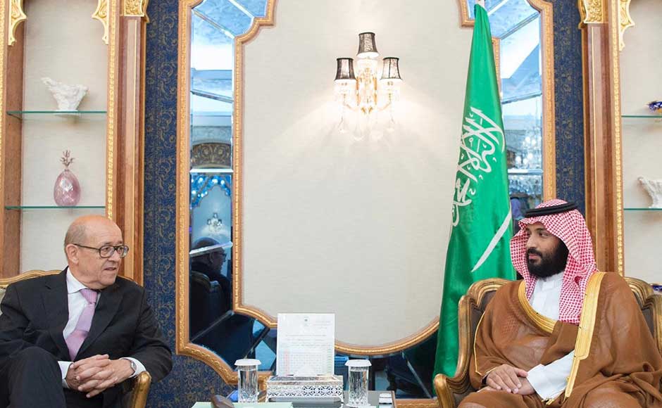 Riyadh and its allies imposed sanctions on Doha on 5 June, including closing its only land border, denying Qatar access to their airspace and ordering their citizens back from the emirate. They accused Doha of supporting extremism and being too close to their arch-rival Iran. In this image, Saudi Crown Prince Mohammed bin Salman, right, receives Le Drian in Jiddah, Saudi Arabia. AP Riyadh and its allies imposed sanctions on Doha on 5 June, including closing its only land border, denying Qatar access to their airspace and ordering their citizens back from the emirate. They accused Doha of supporting extremism and being too close to their arch-rival Iran. In this image, Saudi Crown Prince Mohammed bin Salman, right, receives Le Drian in Jiddah, Saudi Arabia. AP