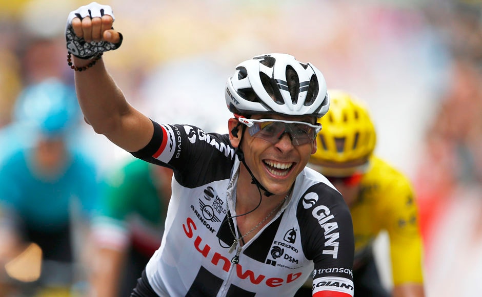 France's Warren Barguil celebrated prematurely as he crossed the finish line, thinking he won the sprint but Colombia's Rigoberto Uran finished ahead of him in a photo-finish to win the ninth stage of the Tour de France cycling race. AP France's Warren Barguil celebrated prematurely as he crossed the finish line, thinking he won the sprint but Colombia's Rigoberto Uran finished ahead of him in a photo-finish to win the ninth stage of the Tour de France cycling race. AP
