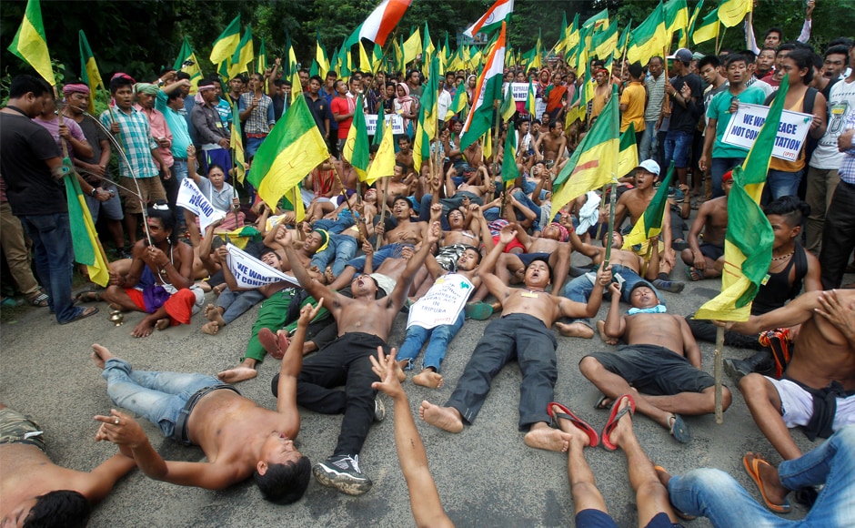 Demonstrators shout slogans as they block a highway during the protest. The state government in a press statement had on Saturday appealed to the IPFT to withdraw the agitation as the people would suffer due to the blockade on the national highway. Reuters Demonstrators shout slogans as they block a highway during the protest. The state government in a press statement had on Saturday appealed to the IPFT to withdraw the agitation as the people would suffer due to the blockade on the national highway. Reuters
