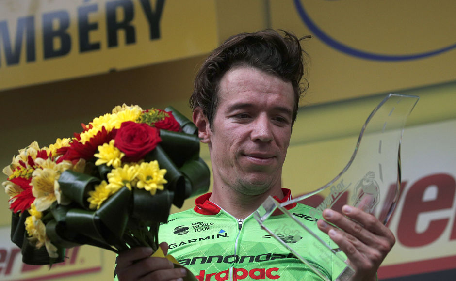 Colombia's Rigoberto Uran celebrates on the podium after winning the ill-fated ninth stage of the Tour de France cycling race. AP Colombia's Rigoberto Uran celebrates on the podium after winning the ill-fated ninth stage of the Tour de France cycling race. AP
