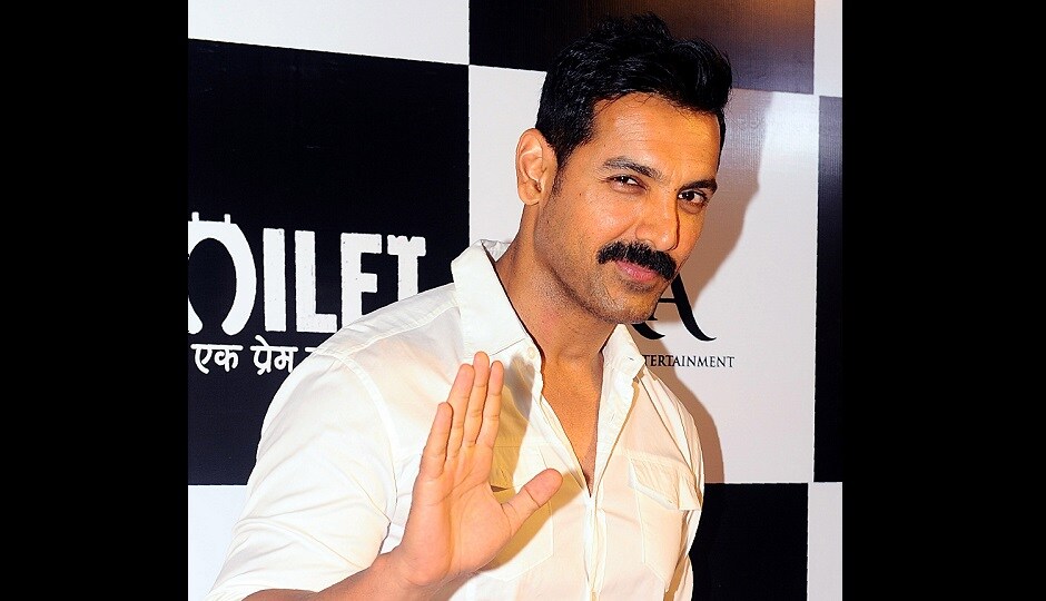 John Abraham at a Mumbai screening of Toilet: Ek Prem Katha. AFP PHOTO John Abraham at a Mumbai screening of Toilet: Ek Prem Katha. AFP PHOTO