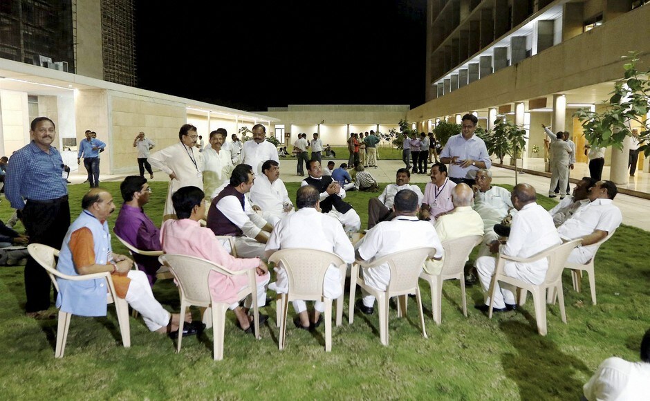 Bharatiya Janata Party MLAs outside the counting centre of Rajya Sabha election votes at Gandhinagar on Tuesday. Counting of votes were suspended for seven hours following Congress seeking disqualification of votes from two rebel MLAs. PTI Bharatiya Janata Party MLAs outside the counting centre of Rajya Sabha election votes at Gandhinagar on Tuesday. Counting of votes were suspended for seven hours following Congress seeking disqualification of votes from two rebel MLAs. PTI