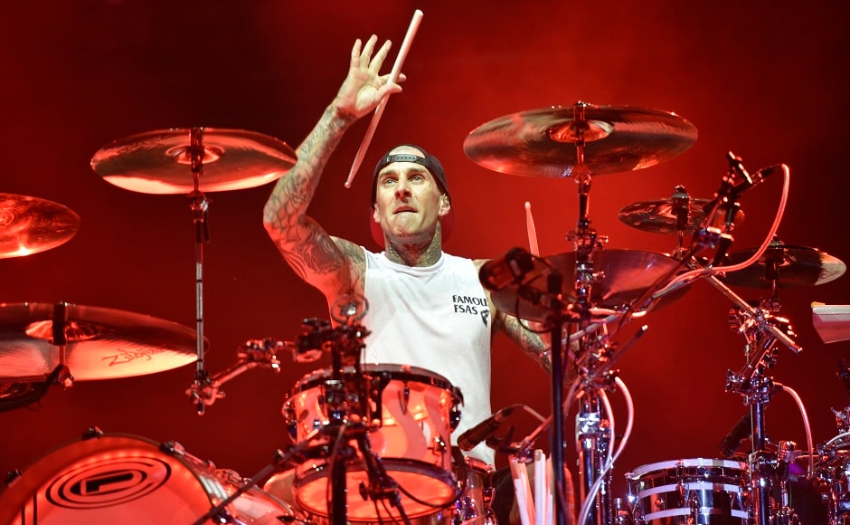 Travis Barker of Blink 182 drums it away at the Lollapalooza music fest in Chicago. Image from AP. Travis Barker of Blink 182 drums it away at the Lollapalooza music fest in Chicago. Image from AP.