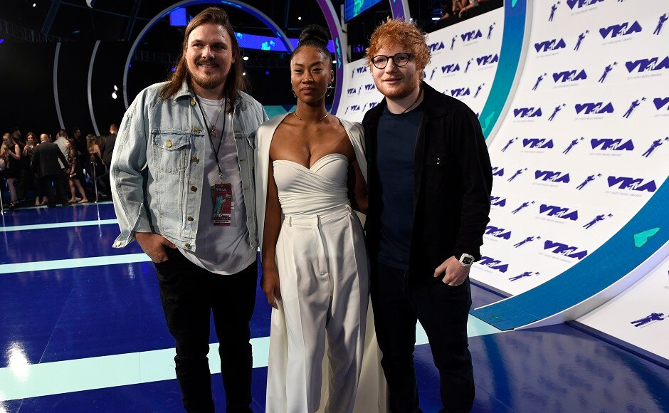 Jason Koenig, from left, Jennie Pegouskie and Ed Sheeran arrive at the MTV Video Music Awards. Photo by AP Jason Koenig, from left, Jennie Pegouskie and Ed Sheeran arrive at the MTV Video Music Awards. Photo by AP