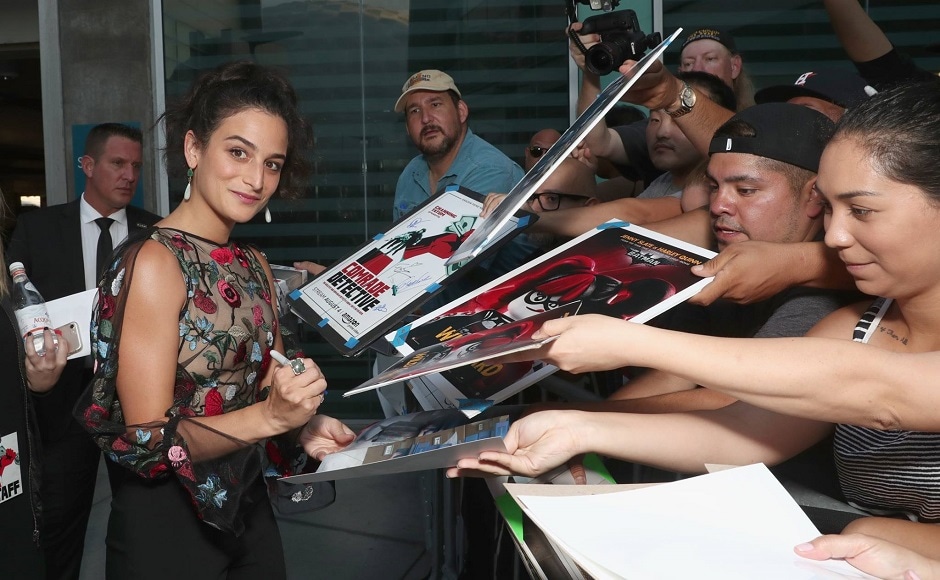 Actor Jenny Slate autographs merchandise for fans present at the Los Angeles premiere of Comrade Detective. Image from Facebook Actor Jenny Slate autographs merchandise for fans present at the Los Angeles premiere of Comrade Detective. Image from Facebook