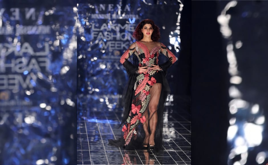 After Kapoor came Jacqueline Fernandez as she walked the ramp in a long-sleeved, embroidered, net floor-skimming creation over micro shorts, which showed off an intensely beaded back and black tulle stole. After Kapoor came Jacqueline Fernandez as she walked the ramp in a long-sleeved, embroidered, net floor-skimming creation over micro shorts, which showed off an intensely beaded back and black tulle stole.