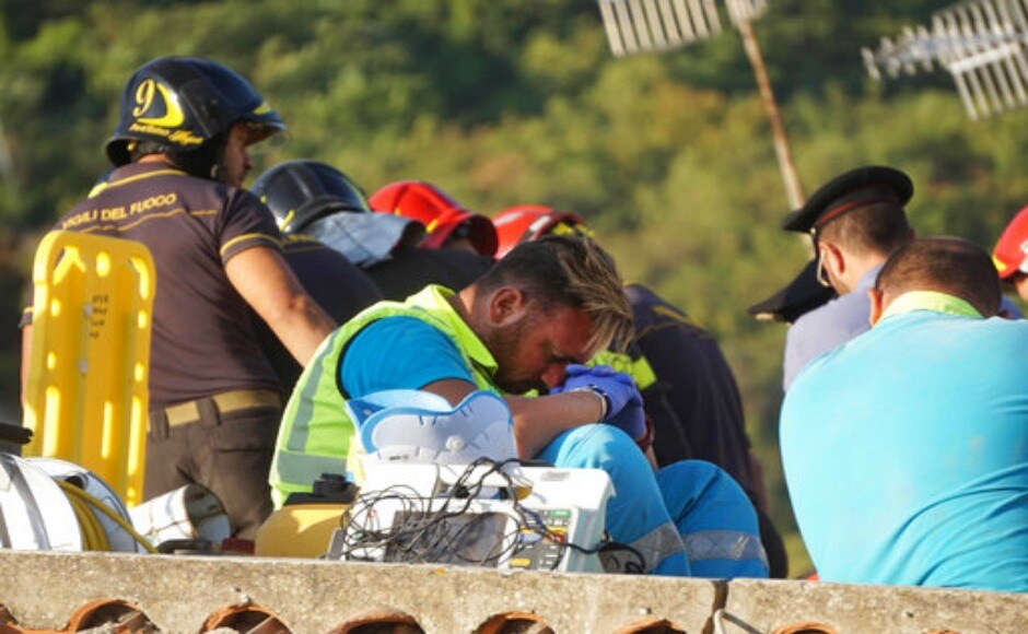 Rescuers at work amongst damaged houses the day after the earthquake in Ischia island that killed two people and injuring over least 39. AP Rescuers at work amongst damaged houses the day after the earthquake in Ischia island that killed two people and injuring over least 39. AP