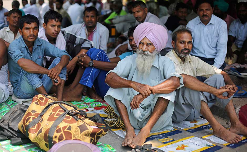 Supporters of Dera Sacha Sauda sect chief Gurmeet Ram Rahim Singh gather at the sect headquarters at Sirsa in Haryana. AP Supporters of Dera Sacha Sauda sect chief Gurmeet Ram Rahim Singh gather at the sect headquarters at Sirsa in Haryana. AP