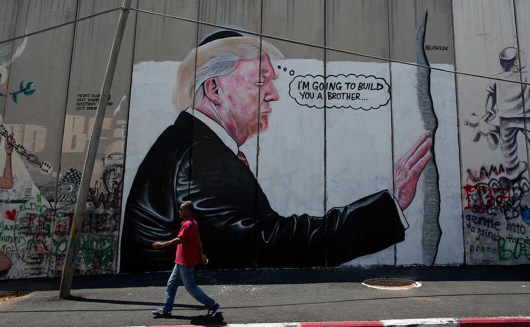 In another drawing, Trump is depicted wearing a Jewish skullcap and placing a hand a wall — a scene taken from the US president's May visit to Jerusalem's Western Wall, the holiest site where Jews can pray. A cartoon In another drawing, Trump is depicted wearing a Jewish skullcap and placing a hand a wall — a scene taken from the US president's May visit to Jerusalem's Western Wall, the holiest site where Jews can pray. A cartoon
