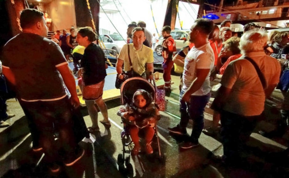 Several tourists fled from Ischia island at Pozzuoli, near Naples. Around 39 people suffered slight injuries however officials fear several others may be trapped in the rubble. AP Several tourists fled from Ischia island at Pozzuoli, near Naples. Around 39 people suffered slight injuries however officials fear several others may be trapped in the rubble. AP