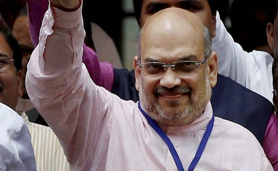 Shah flashes victory sign after casting his vote in Gujarat Rajya Sabha election, in Gandhinagar on Tuesday. PTI Shah flashes victory sign after casting his vote in Gujarat Rajya Sabha election, in Gandhinagar on Tuesday. PTI