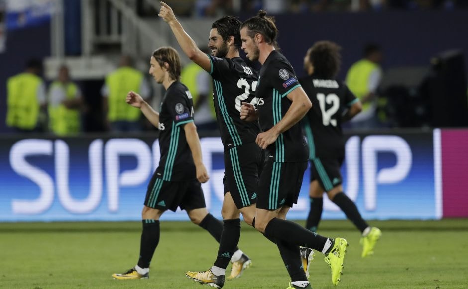 Isco (centre), extended the lead for Real Madrid with a shot in the 52nd, after Gareth Bale helped him run through United's defense. AP Isco (centre), extended the lead for Real Madrid with a shot in the 52nd, after Gareth Bale helped him run through United's defense. AP
