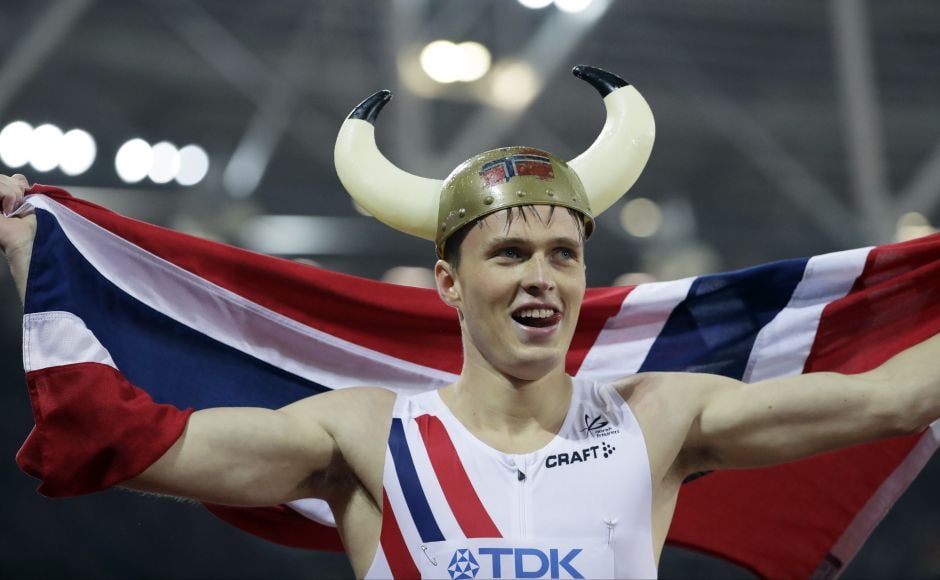 The 21-year-old Karsten Warholm earned his first major title, and then looked up in amazement as the result showed on the giant screen. AP The 21-year-old Karsten Warholm earned his first major title, and then looked up in amazement as the result showed on the giant screen. AP