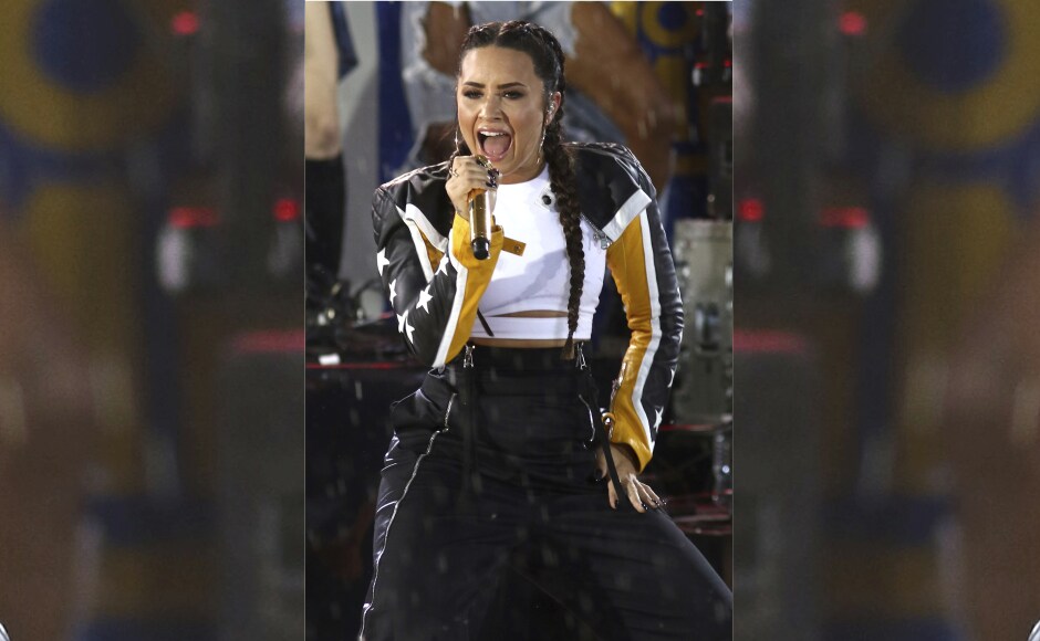 Fans were left enthralled after an energetic show by the singer. Image from AP. Fans were left enthralled after an energetic show by the singer. Image from AP.
