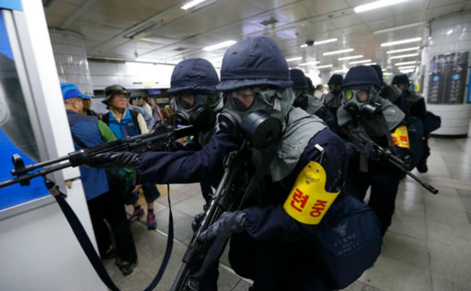 South Korean police officers conduct an anti-terror drill as part of Operation Ulchi Freedom Guardian exercise at a subway station in Seoul, South Korea on Tuesday. AP South Korean police officers conduct an anti-terror drill as part of Operation Ulchi Freedom Guardian exercise at a subway station in Seoul, South Korea on Tuesday. AP