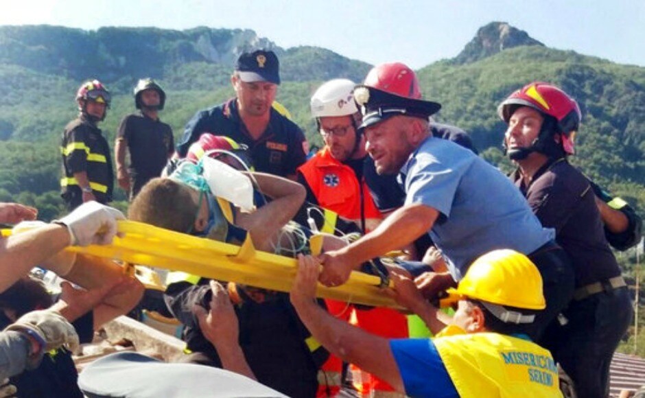 Firefighters and rescuers pull out a boy, Mattias, from the collapsed building in Casamicciola, the epicenter of a 1883 earthquake that killed more than 2,000 people. AP Firefighters and rescuers pull out a boy, Mattias, from the collapsed building in Casamicciola, the epicenter of a 1883 earthquake that killed more than 2,000 people. AP