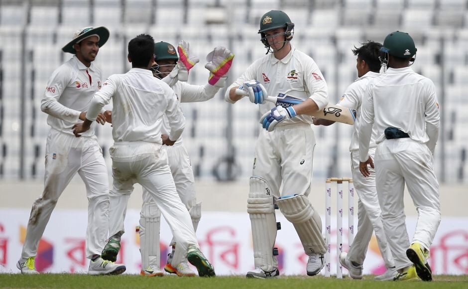 Matt Renshaw and Peter Handscomb resisted the Bangladesh spinners on a tricky wicket in a 69-run fifth-wicket stand and appeared to be settling in. But left-arm spinner Taijul Islam got a vital breakthrough with a ball that kept low and trapped Handscomb lbw. AP Matt Renshaw and Peter Handscomb resisted the Bangladesh spinners on a tricky wicket in a 69-run fifth-wicket stand and appeared to be settling in. But left-arm spinner Taijul Islam got a vital breakthrough with a ball that kept low and trapped Handscomb lbw. AP