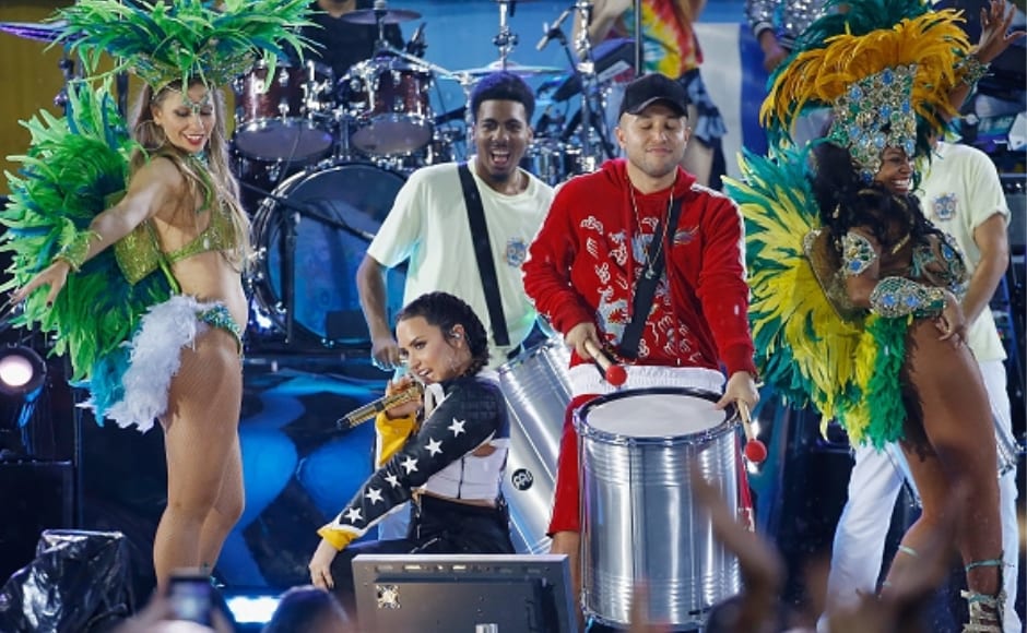 The concert was a colourful affair, with Lovato and her back-up dancers in exotic costumes. Image from Getty Images. The concert was a colourful affair, with Lovato and her back-up dancers in exotic costumes. Image from Getty Images.
