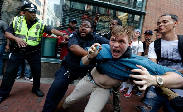 Thousands rally in Boston protesting far-right groups' 'free speech' rally Thousands rally in Boston protesting far-right groups' 'free speech' rally